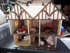 A scratch built Tudor style doll's house,