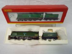 Hornby - an OO scale model 4-6-2 Battle of Britain class locomotive and tender,