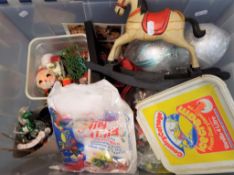 A box containing vintage Christmas items and craft items