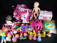 A good mixed lot of children's toys, games, including roller skates, paddling pool,