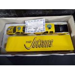 A Jerry Nadeau NASCAR Cartoon Network Jetsons show trailer and car collection by Brookfield