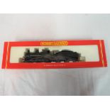 Hornby - an OO scale model 0-6-0 Dean Goods locomotive and tender, green GWR livery op no 2468,