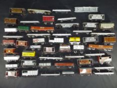 Model Railways - Hornby Dublo - in excess of 50 unboxed OO gauge wagons in playworn condition.