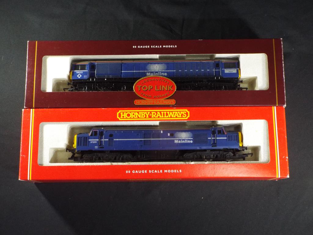 Model Railways - Hornby OO gauge - two diesel locomotives in Mainline livery comprising #R2011A and