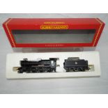 Hornby - an OO gauge model 4-6-0 locomotive and tender,