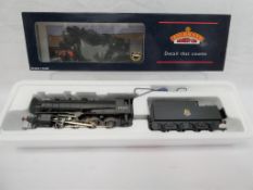 Bachmann Branch Line - an OO gauge 2-8-0 locomotive and tender WD Austerity class,