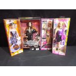 Barbie by Mattel - a collection of four boxed Barbie dolls to include Then and Now Bathing Suit