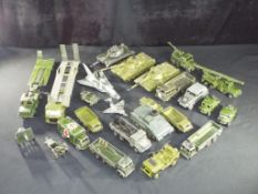 Diecast - Dinky - twenty five unboxed diecast military vehicles by Dinky Toys,