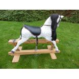 Rocking Horse - a vintage dappled grey rocking horse with black leather studded saddle,