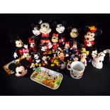 Disneyana - a collection of in excess of 15 Walt Disney figurines predominantly Mickey and Minnie