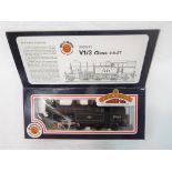 Bachmann Branch-Line - an OO scale model tank locomotive 2-6-2T, op no 67666, BR black livery,