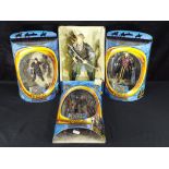 Lord of The Rings - a collection of four Lord of The Rings figurines, comprising Eomer, Frodo,