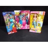 Barbie by Mattel - a collection of three boxed Barbie dolls to include Disney Winnie the Pooh