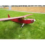 A Remote Control Model Airplane - Petrol powered. Model comes with engine.