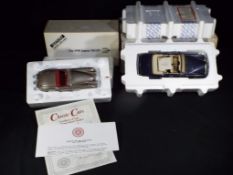 Franklin Mint - two boxed 1:24 scales model vehicles by Franklin Mint,