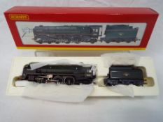 Hornby - an OO scale model 4-6-2 Britannia class 7MT locomotive and tender,