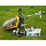 Remote Control - a remote controlled Mini-Boy Nitro powered helicopter with Ripmax power panel and