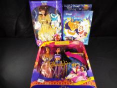 Disneyana - a collection of Disney dolls to include Aladdin gift set by Mattel, model #10657, boxed,