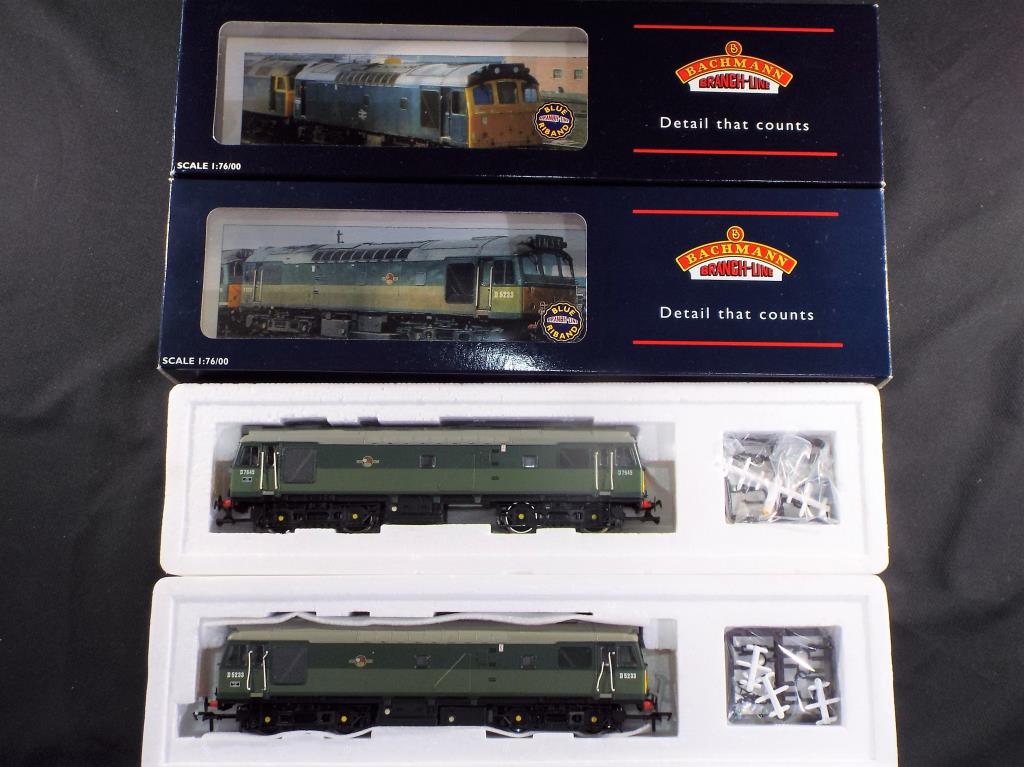 Model Railways - Bachmann OO gauge - two Class 25 diesels in BR green comprising 32-400 and 32-411,