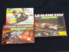 Three Scalextric sets, comprising Le Mons 24 hours, Jaguar Challenge and Motor GP,