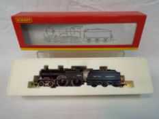 Hornby - an OO gauge model 4-4-0 locomotive and tender, class 2P, op no 40634, BR black livery,