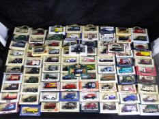Lledo - Approximately 80 diecast model vehicles in original window boxes by Lledo.