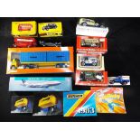 Tekno, Budgie and Others - A mixed collection of boxed diecast, plastic models in various scales,