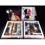 Barbie by Mattel - a collection of four boxed Barbie dolls,