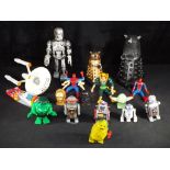 A good mixed lot of seventeen items, including four robots [tinplate, wind up Terminator],