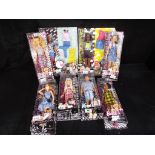 Barbie by Mattel - a collection of eight Brbie Fashionistas dolls in blister packs to include model