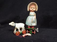 Clockwork Toys - an early celluloid wind up Mark Had a Little Lamb boxed doll, made in Tokyo,