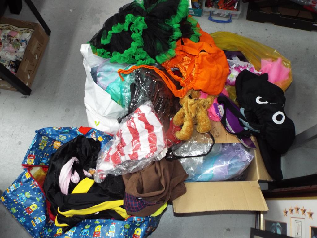 Fancy Dress - Four large bags and a box consisting of Fancy Dress clothing and novelty items.