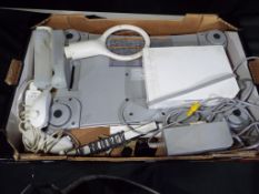Nintendo - An unboxed Nintendo Wii console with a Wii Balance Board and a collection of Wii