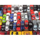 Burago, Welly, Hongwell and others - Approximately 40 unboxed diecast 1:43 scale model vehicles.