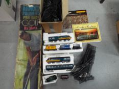 Hornby - Two unboxed OO Gauge railway Locomotives, rolling stock, a quantity of track, controllers,
