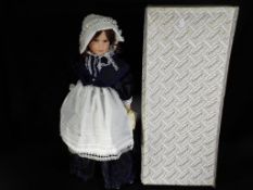 An Alberon porcelain dressed doll, entitled Florence Nightingale, contained in original box.