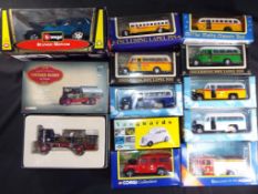 Corgi, Vanguards, Burago and others - 13 boxed diecast model vehicles in various scales.