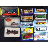 Corgi, Vanguards, Burago and others - 13 boxed diecast model vehicles in various scales.