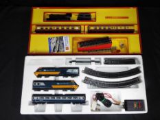 Hornby & Tri-ang - Two OO gauge train sets,