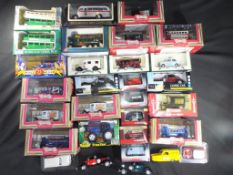 Corgi,Lledo and others - 30 predominately boxed diecast model vehicles in various scales.