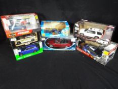 Diecast Vehicles - a collection of seven boxed model cars to include Next models,