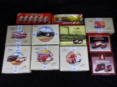 Corgi, Britains - Nine boxed diecast model vehicles by Corgi and two set of Britains Toy Soldiers.