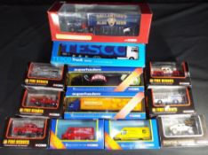 Corgi and Other - 12 boxed diecast model vehicles in various scales predominately by Corgi.