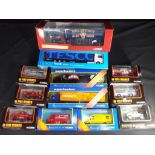 Corgi and Other - 12 boxed diecast model vehicles in various scales predominately by Corgi.