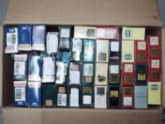 Lledo - In excess of 70 boxed diecast model vehicles.