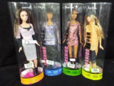Barbie by Mattel - a collection of four Fashion Fever Barbie to include Desiree, Kayla,
