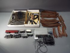 Lot to include a Triang TT gauge trainset comprising two locos, coach, goods wagons, track,