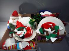 Christmas - Two boxes of festive Christmas decorations, accessories and props.