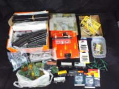 Hornby and Others - A quantity of OO gauge model railways scenic buildings, accessories,