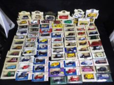 Lledo - Approximately 80 boxed diecast model vehicles by Lledo.